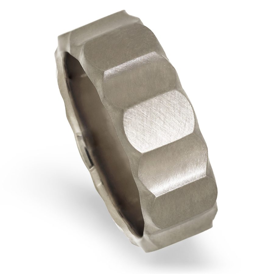 Men’s sculptural ring in 18K white gold with matte finish and faceted design