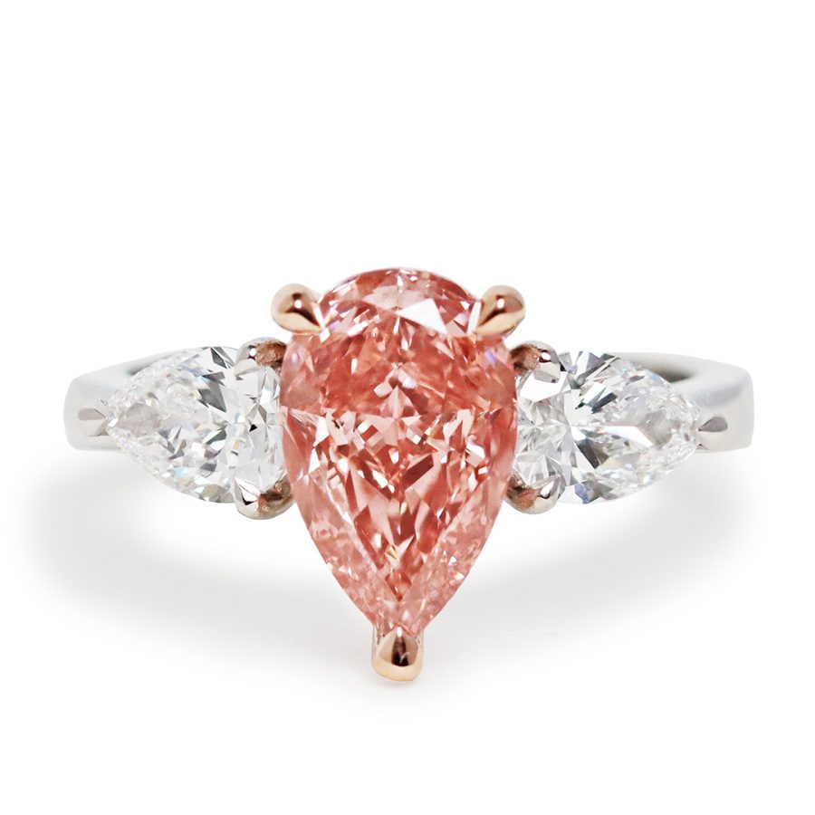 Platinum Rose Gold Trilogy Ring, Lab Grown Pear Shape Pink Diamond centerstone, Lab Grown Pear Shape White Diamonds, Natural Pavé Diamonds